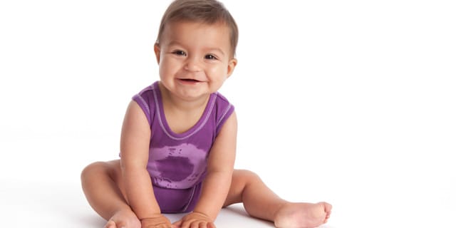 Smiling infant on floor